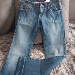 Baby Phat Blue Flare Leg Distressed Jeans with Embellished LOWRISE Waist..